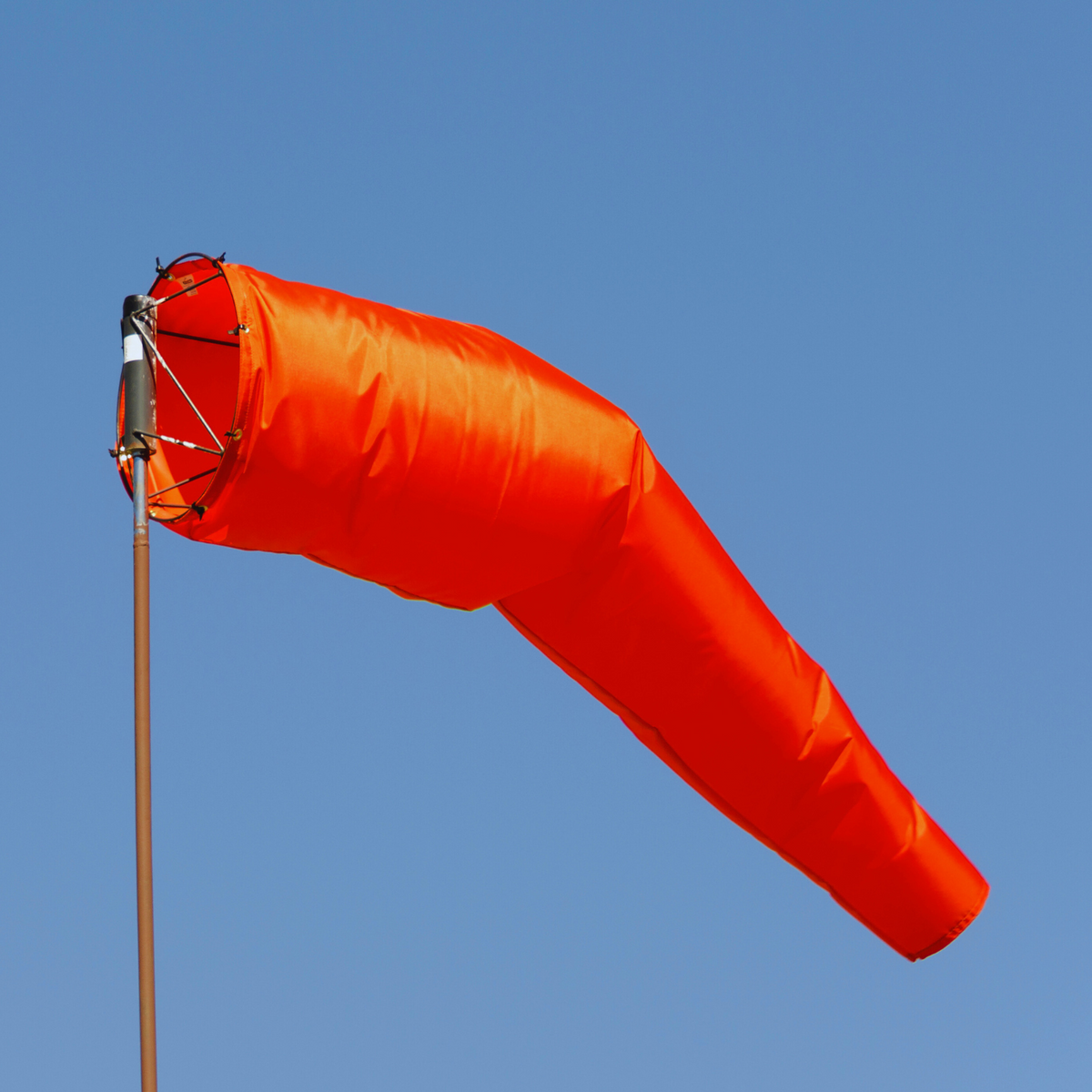 Orange airport windsock kit with heavy duty frame for airports, crop dusting, air strip and airfields. Great for industrial, oilfield and agricultural use