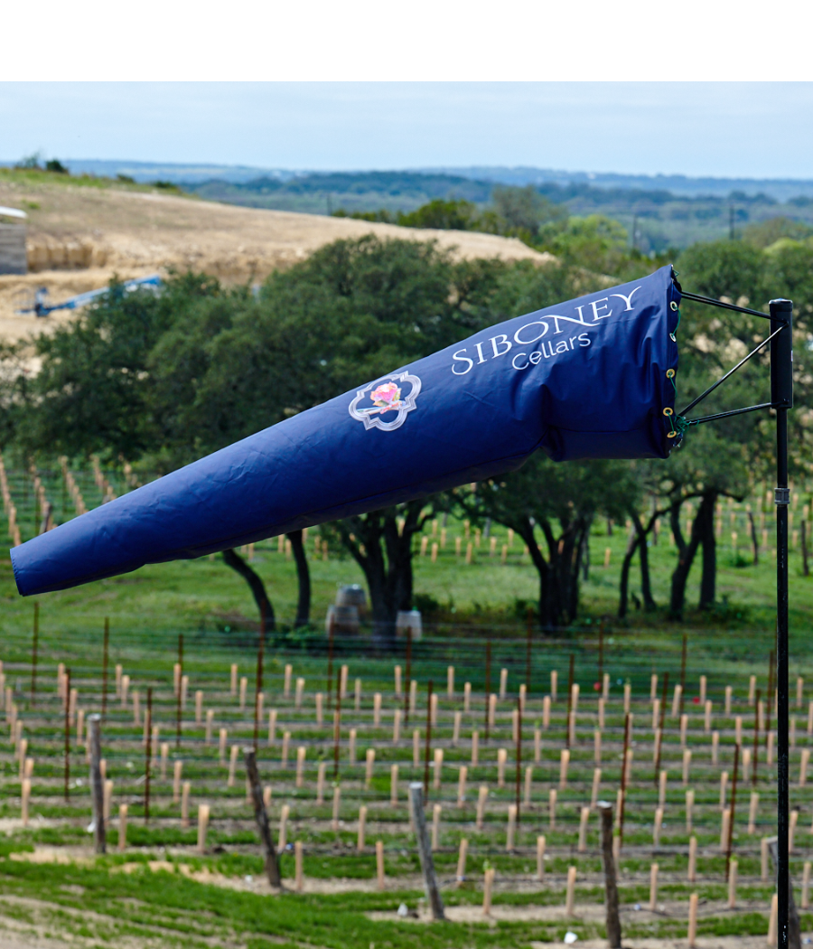 custom printed windsock for seeding, crop sraying, crop dusting purposes. custom printed with vinyard name on windsock 