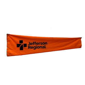 Custom printed orange aviation windsock for hospital helipads. Fire and water resistant. 